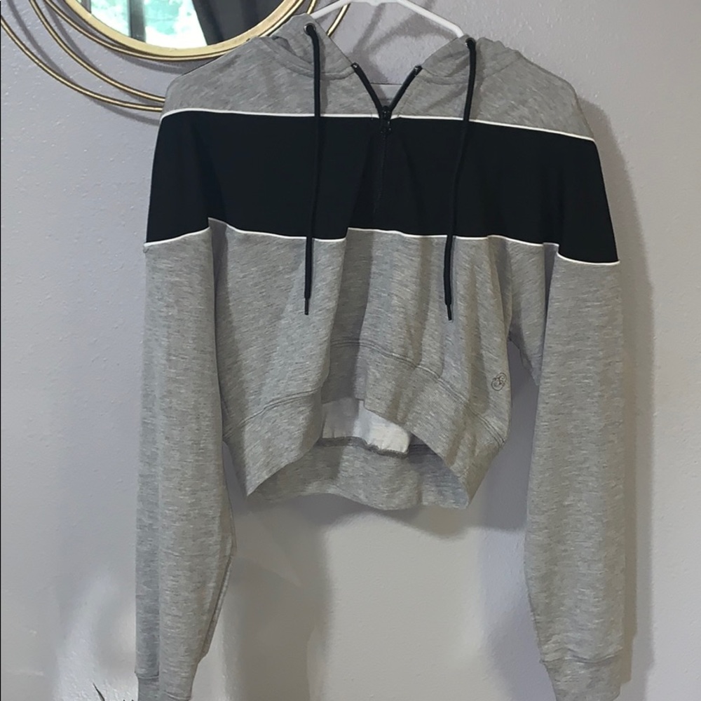 Cropped sweater. Size M. Brand new.